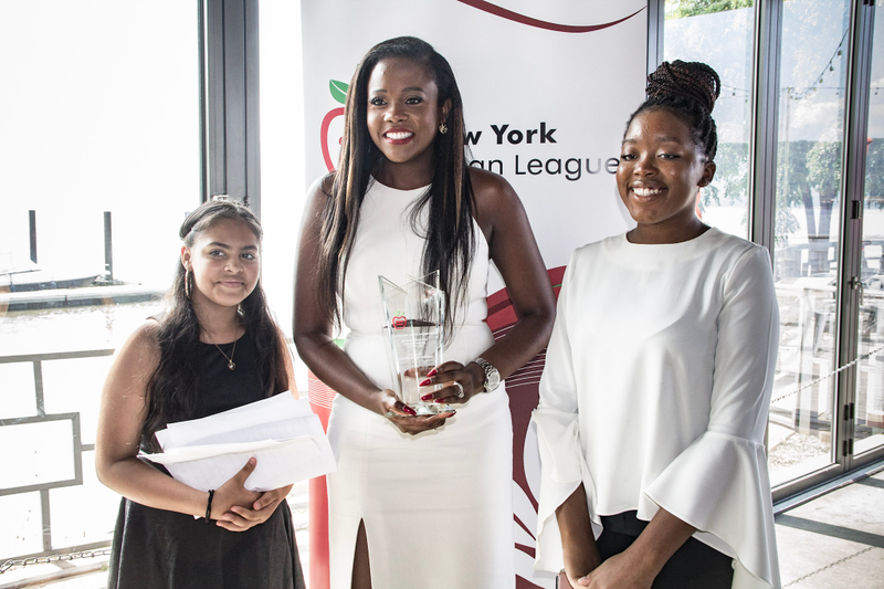 Camille Joseph Goldman (center), vice president of state government affairs at Charter Communications and recipient of the David N. Dinkins Award for Service, Leadership and Social Justice, with New York Urban League Summer STEAM participants (Malik Yusef Cumbo/MYC Photographics.com)